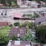 Vista panorámica de un área residencial afectada por una inundación.