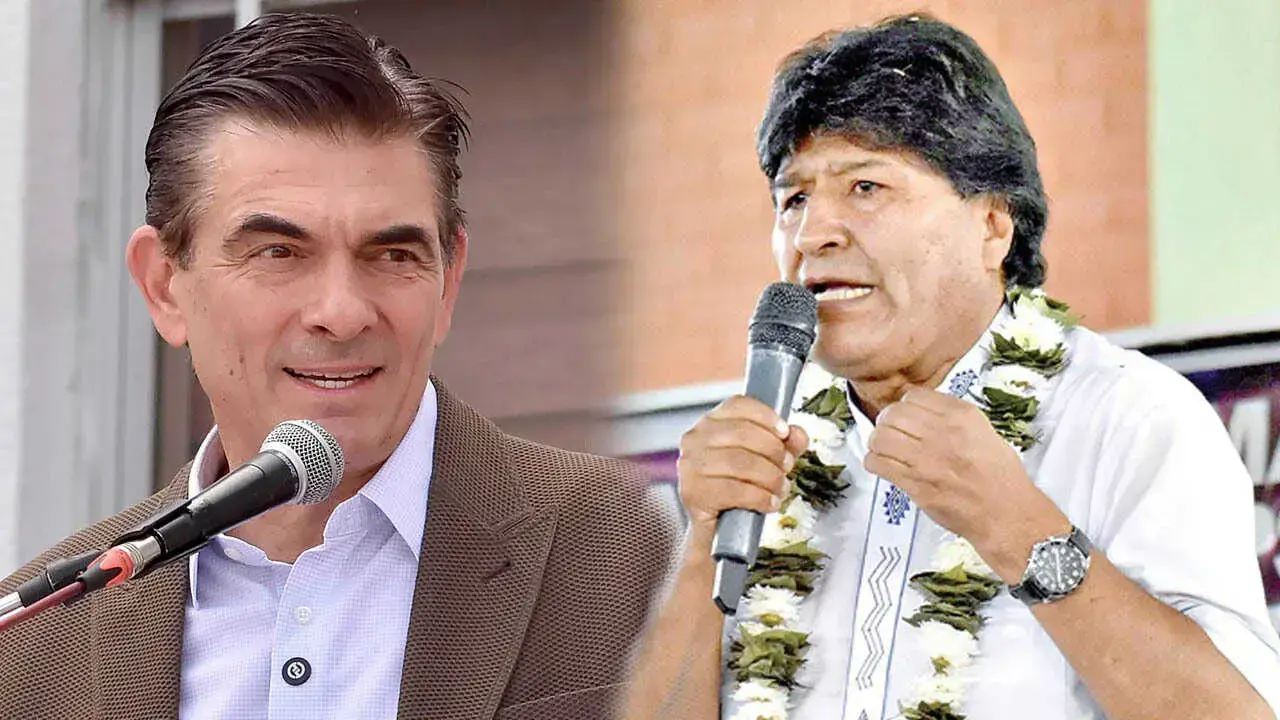 El presidente de Bolivia, Rodrigo Paz (i), y el dirigente cocalero, Evo Morales.