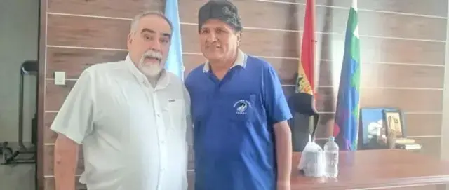 Captura de video donde aparece Carlos Subirana con Evo Morales.