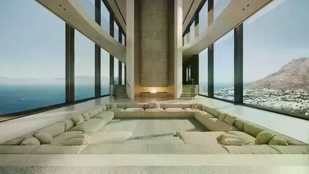 Vista interior de un penthouse con vistas panorámicas.