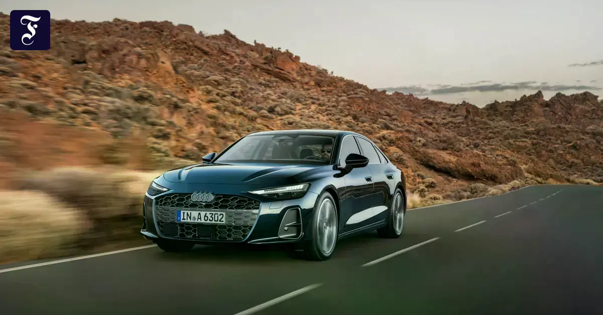 Audi A6 Limousine de color oscuro, una berlina clásica con líneas deportivas.