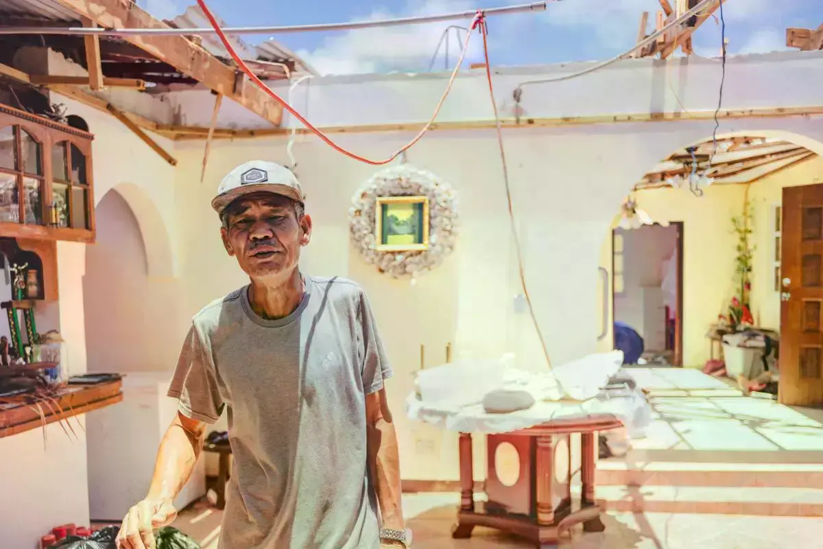 Harsh sun floods the homes of local families. Their belongings are either stored away or ruined by the storm. Family artifact