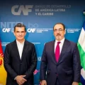 El presidente ejecutivo de CAF, Sergio Díaz Granados, y el presidente Rodrigo Paz.
