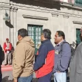 El momento de la llegada de los dirigentes de los choferes al diálogo.