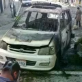 Vehículos policiales quemados