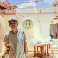 Harsh sun floods the homes of local families. Their belongings are either stored away or ruined by the storm. Family artifact